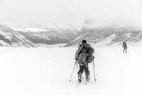 Slowly skiing under the cloud cap.