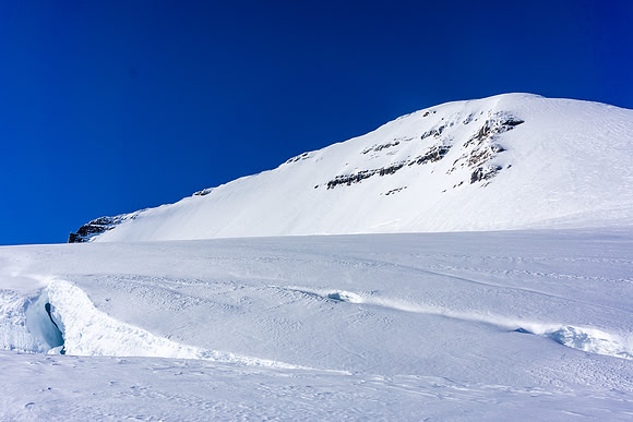 A nice-sized hole sitting below the normal ascent route (east ridge) on Columbia.