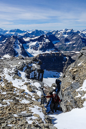 A final, easy, scree chimney to the summit ridge.