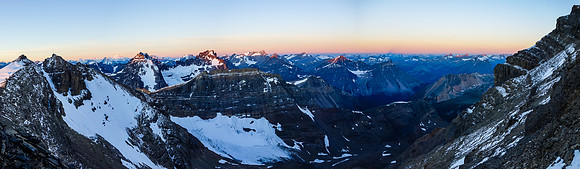 The sun finally rises on the surrounding peaks - notably peak 9900' on the left, with Belanger and Lapensee catching alpine glow over Fat Bastard.