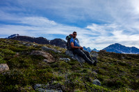 A very satisfied Kevin Barton takes a well-deserved rest break in the alpine meadows above the Geraldine Lakes.