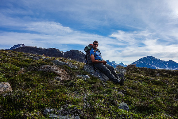 A very satisfied Kevin Barton takes a well-deserved rest break in the alpine meadows above the Geraldine Lakes.