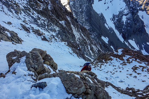 Looking down at Eric as we ascend another steep snow gully on the face.
