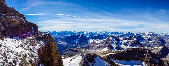 The scree traverse around the summit block, east of the topping out point from the face. You can see Ferenc standing on the final summit ridge.