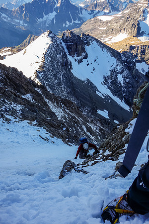 Looking down at Eric as we ascend another steep snow gully on the face.
