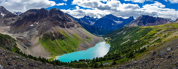 Upper Divergence Lake with the lower one just visible and Curl Peak rising in the distance at center.