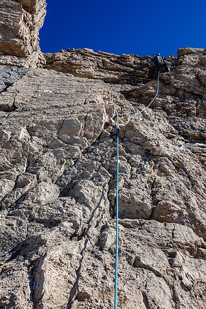 Looking up as Kev nears the end of the last climbing pitch before the summit block.