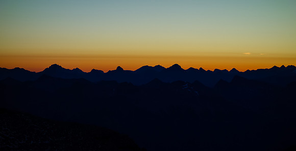 A gorgeous sunrise to the east as we pop onto the 9900' col.
