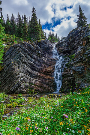 A small waterfall along the way to the alpine meadows above the fifth lake.