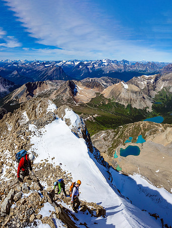 Reluctantly leaving the sublime views to descend the face before things heat up too much and rock fall becomes an issue.