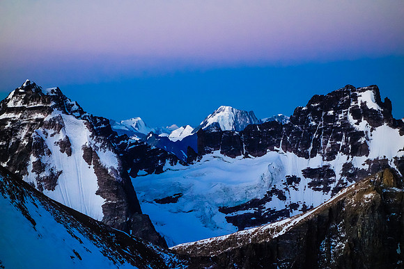 Incredible lighting to the southwest including Belanger (L) and Lapensee (R). The north face of Serenity Peak at center.