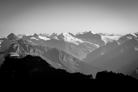 Gazing over the summit of Fortress Mountain towards the Chaba Icefield.
