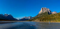 Liam crosses the Chaba with Quincy on the left and Fortress Mountain towering above.