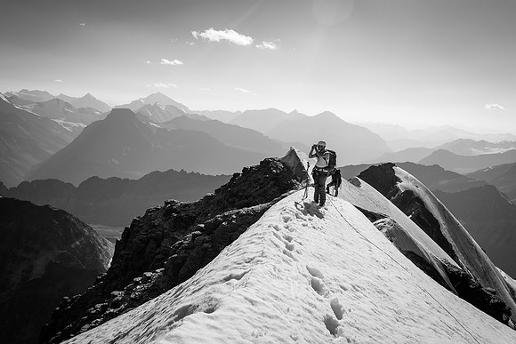 Eric scopes out peaks from the summit of Catacombs Mountain.
