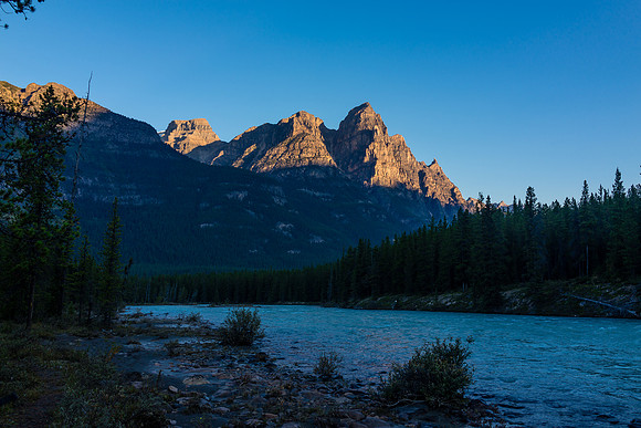 Dragon Peak rises above the Athabasca River near the bridge crossing point.