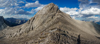 Thankfully the difficult upper SW ridge can be bypassed on scree at climber's right.