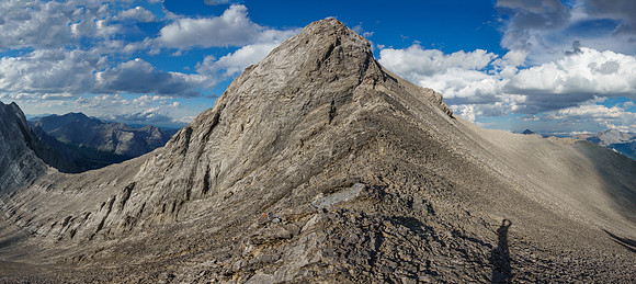 Thankfully the difficult upper SW ridge can be bypassed on scree at climber's right.