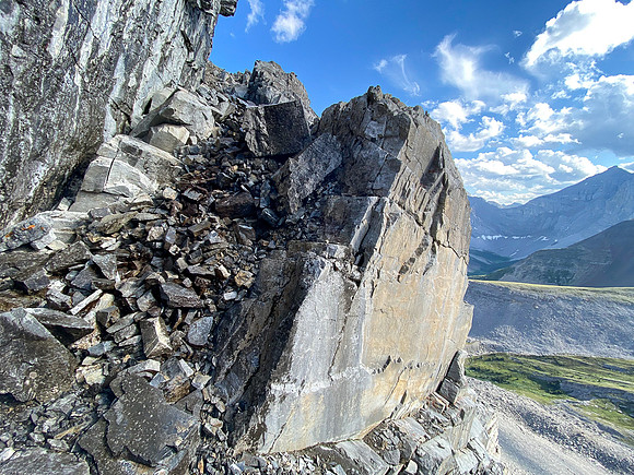 A hidden staircase breaks through the steep western cliff band on Apparition Mountain.