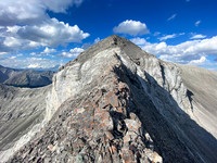 A narrow section along the SW ridge.