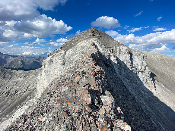 A narrow section along the SW ridge.