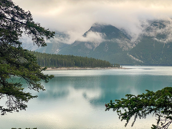 Early morning mist over Lake Minnewanka.