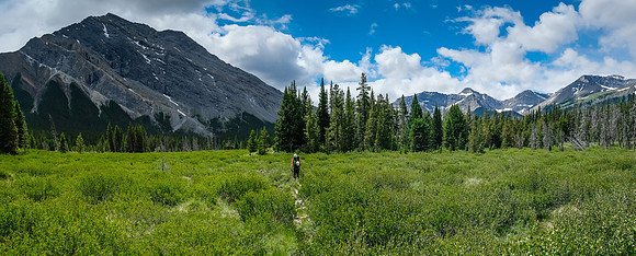 Hiking the Red Deer River trail under Prow Mountain.