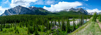 Hiking the Red Deer River trail past Mount White (L) and Prow (R).