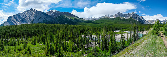Hiking the Red Deer River trail past Mount White (L) and Prow (R).