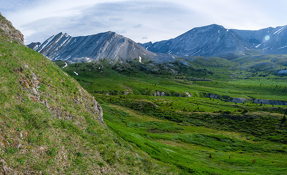 Traversing into the NW valley of McConnell Creek.