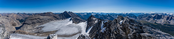 Views back along the summit ridge at right and over the glacier to Harris and the Willingdon group.