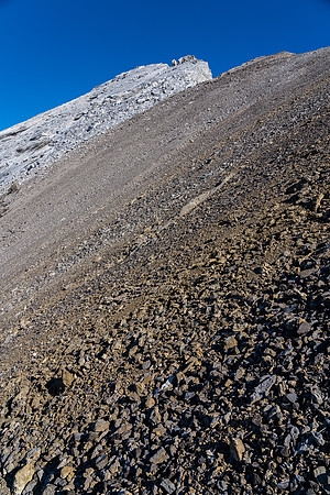 The summit block looks intimidating from the top of the SW ridge.