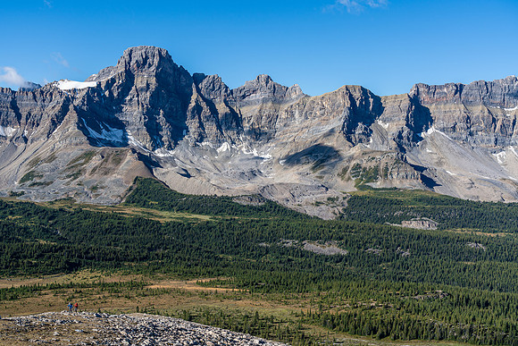 Mike and Cornelius are tiny on the lower SW ridge with Watermelon Peak looming across the Siffleur.