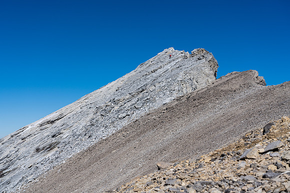 Mike descends the slabby summit block.