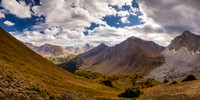Looking down from the ascent slopes of Pocaterra Ridge. From right to left, Tyrwhitt, Grizzly Ridge, Highwood Ridge, Storm, Little Arethusa.