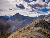 Hanneke at the summit ridge of Pocaterra Ridge with Tyrwhitt in the background at left.