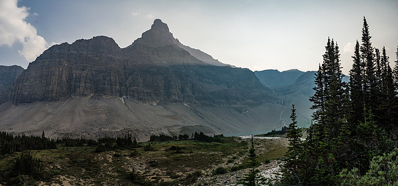 An impressive outlier of Drummond towers over the third lake as we approach our bivy - at lower center across the stream.
