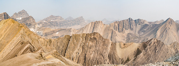 One of my favorite shots from the trip shows a tiny Phil on the west ridge descent of McConnell with a barren desert Rockies landscape fading in smoke to the north.