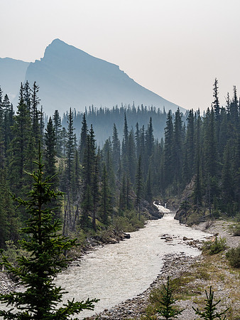 Looking back upstream of the now-raging Red Deer River after it merged with the Drummond Icefield outflow stream. Mount Douglas in the background.