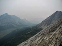 Looking towards Skoki Mountain at center distance with Fossil at left and an unnamed summit at right. No views today, unfortunately.