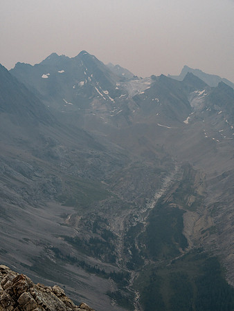 The Bonnet Icefield is located up this valley and beyond. I'm not sure there's any named summits visible here but Hickson Peak is somewhere on this line.