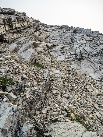 Looking back up my descent line I realize that it's still a bit of a confusing mess. Pick your poison I suppose. Scree or slabs or both? Your choice on this little mountain!