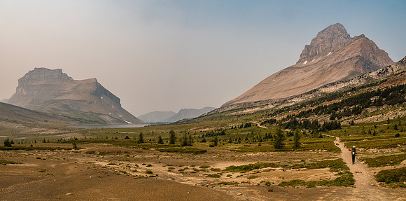 Hiking towards Ptarmigan Lake with Redoubt Mountain at left and Ptarmigan Peak rising above Phil at right.