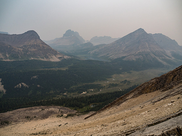 Smokey views past Brachiopod over Baker Lake towards Ptarmigan looming over Packers and Deception Passes. Fossil Mountain at right.