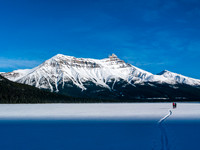 Skiing across Hector Lake.
