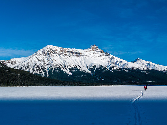 Skiing across Hector Lake.
