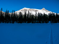 Skiing across Hector Lake.