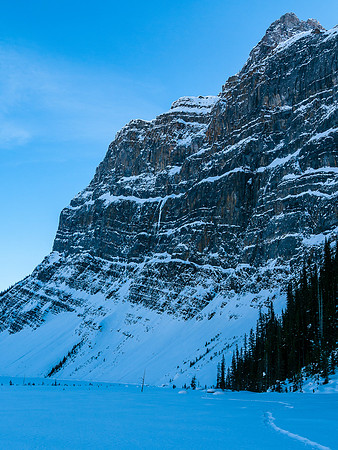 Skiing across Hector Lake.