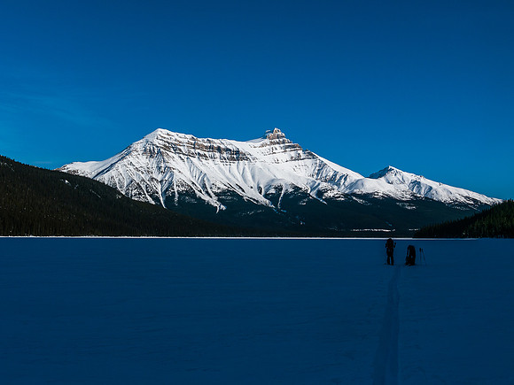 Skiing across Hector Lake.