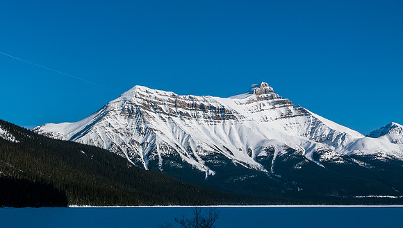 Skiing across Hector Lake.