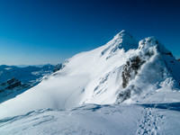 Looking back as we prepare for the ski down from the high col (OOS at right here).